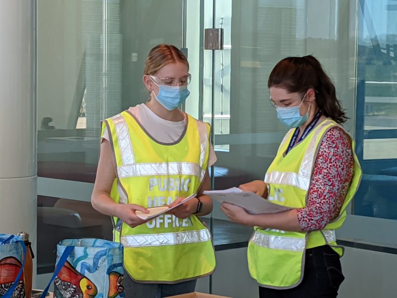 ACT public health officers screen passengers at Canberra Airport