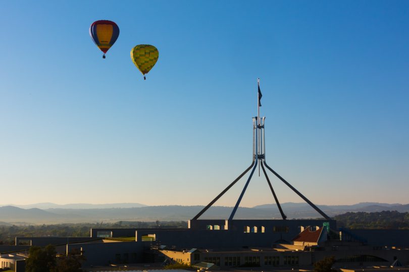 Hot air balloons over Australian Parliament House