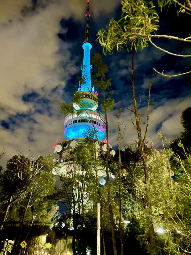Telstra tower lit up blue