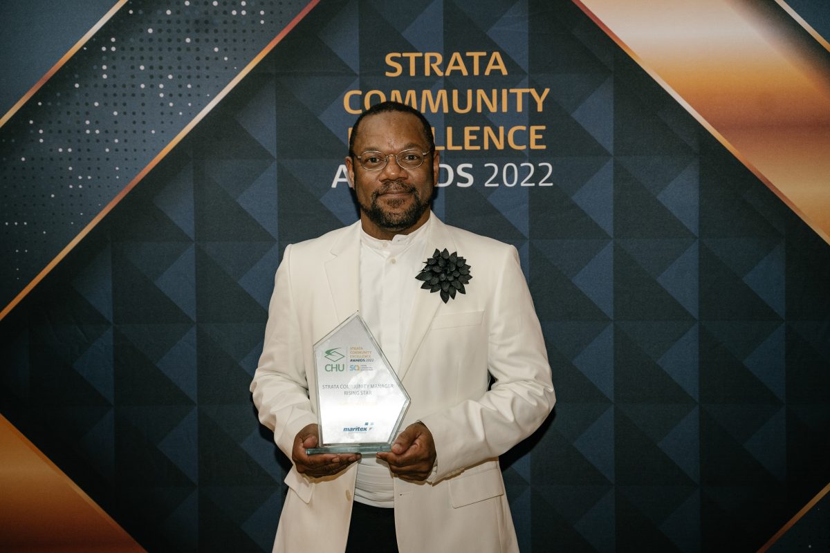 Independent Property Group's Sheldon Boger holding his award at the 2022 ACT CHU SCA Strata Community Awards