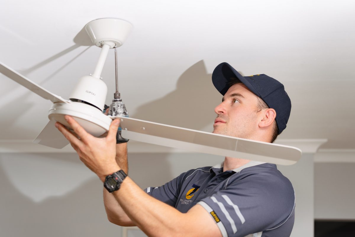 Man installing fan