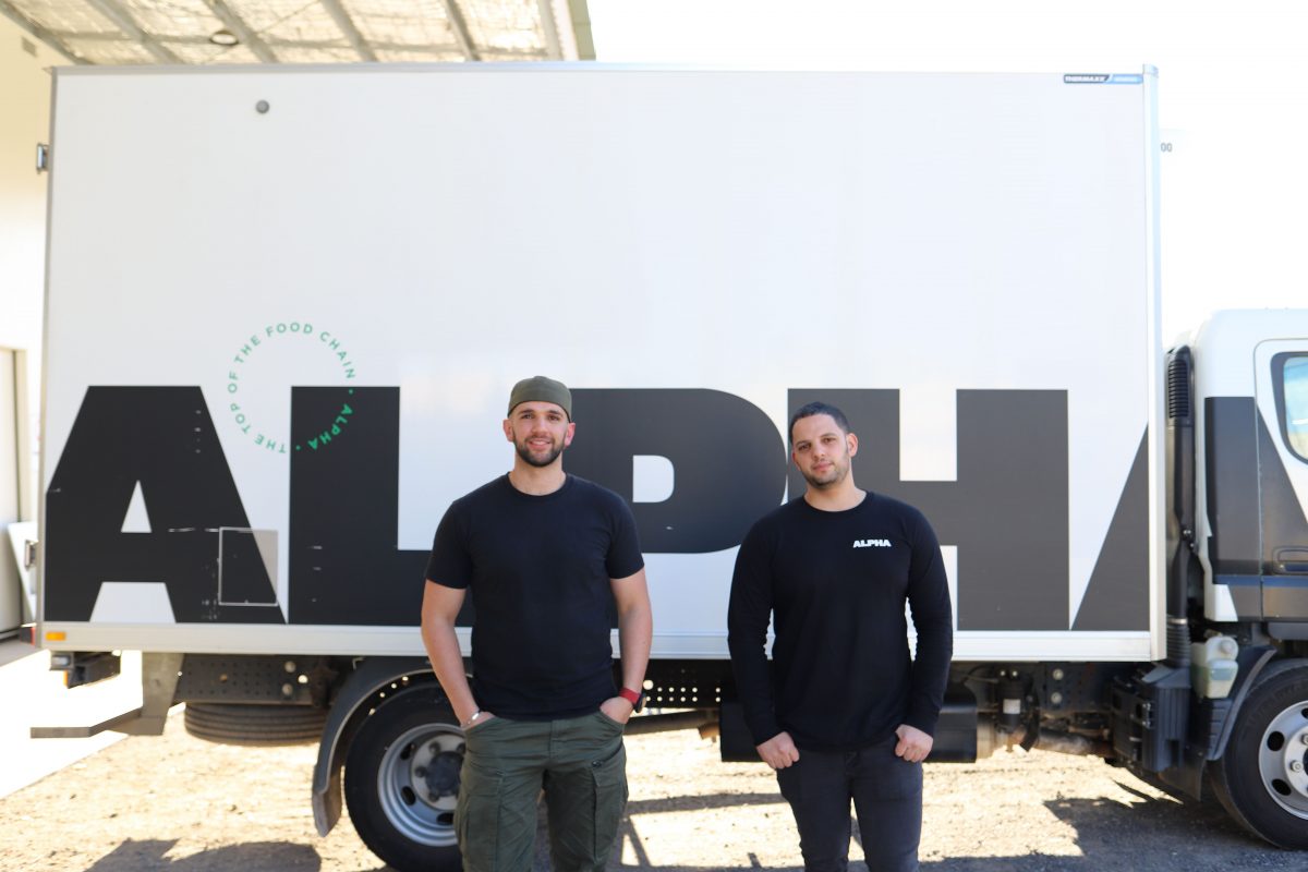Frank and Giuseppe Iannelli in front of an Alpha Fresh delivery truck