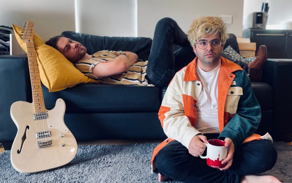 two men in a lounge room