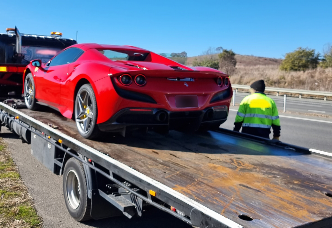 seized red Ferrari