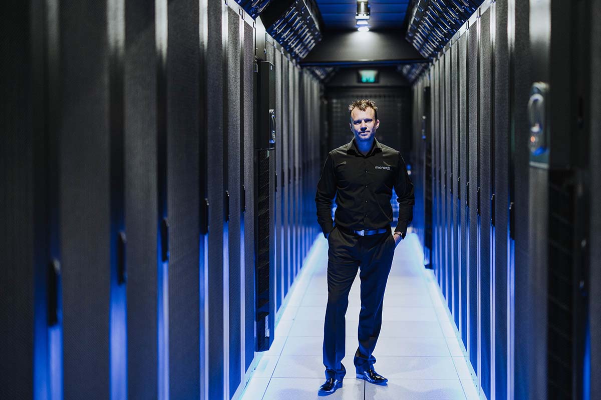 James Braunegg stands by servers stored at Micron21 data centre