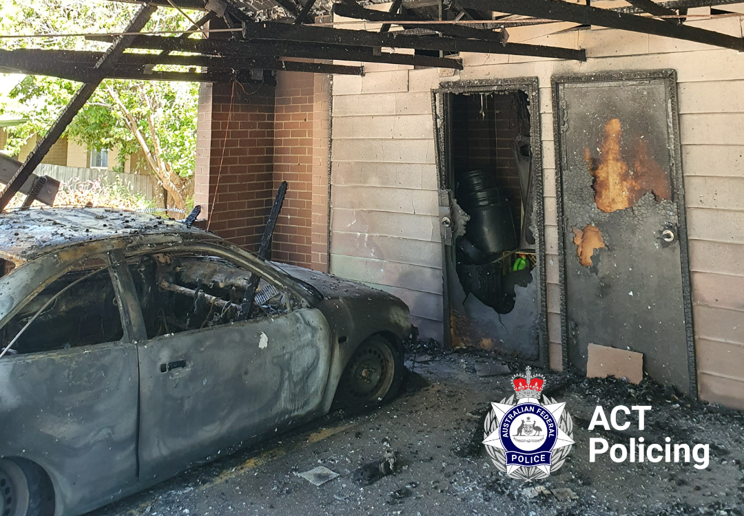 house and car damaged by fire