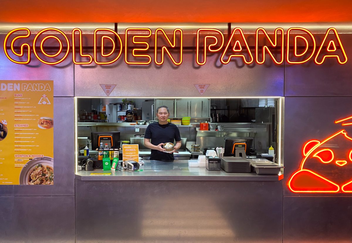 chef at window of golden panda restaurant