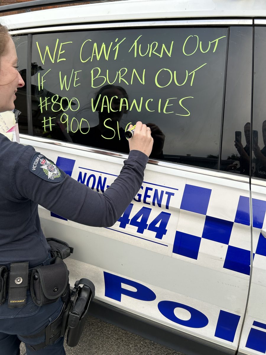 Victoria Police car with slogans