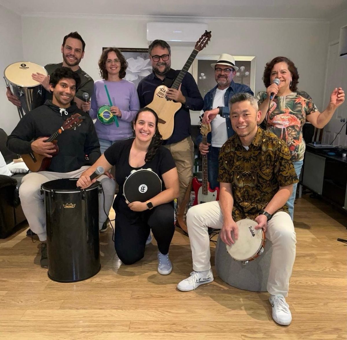 Capital Samba ensemble gathered with instruments