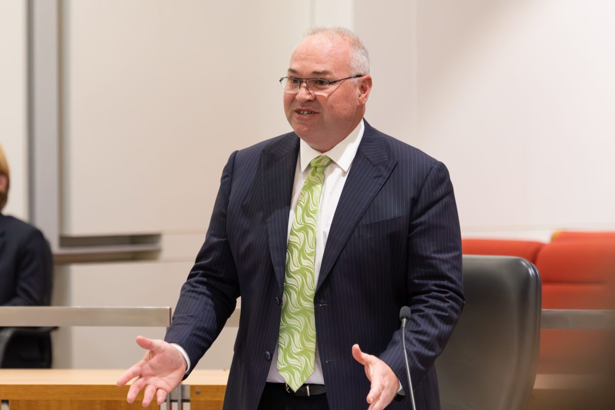 Man speaking into microphone