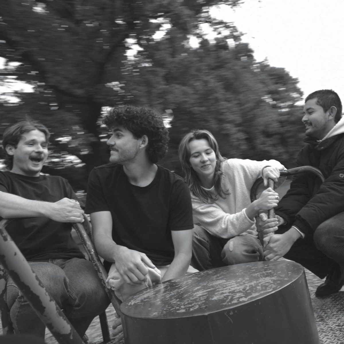 people on merry go round