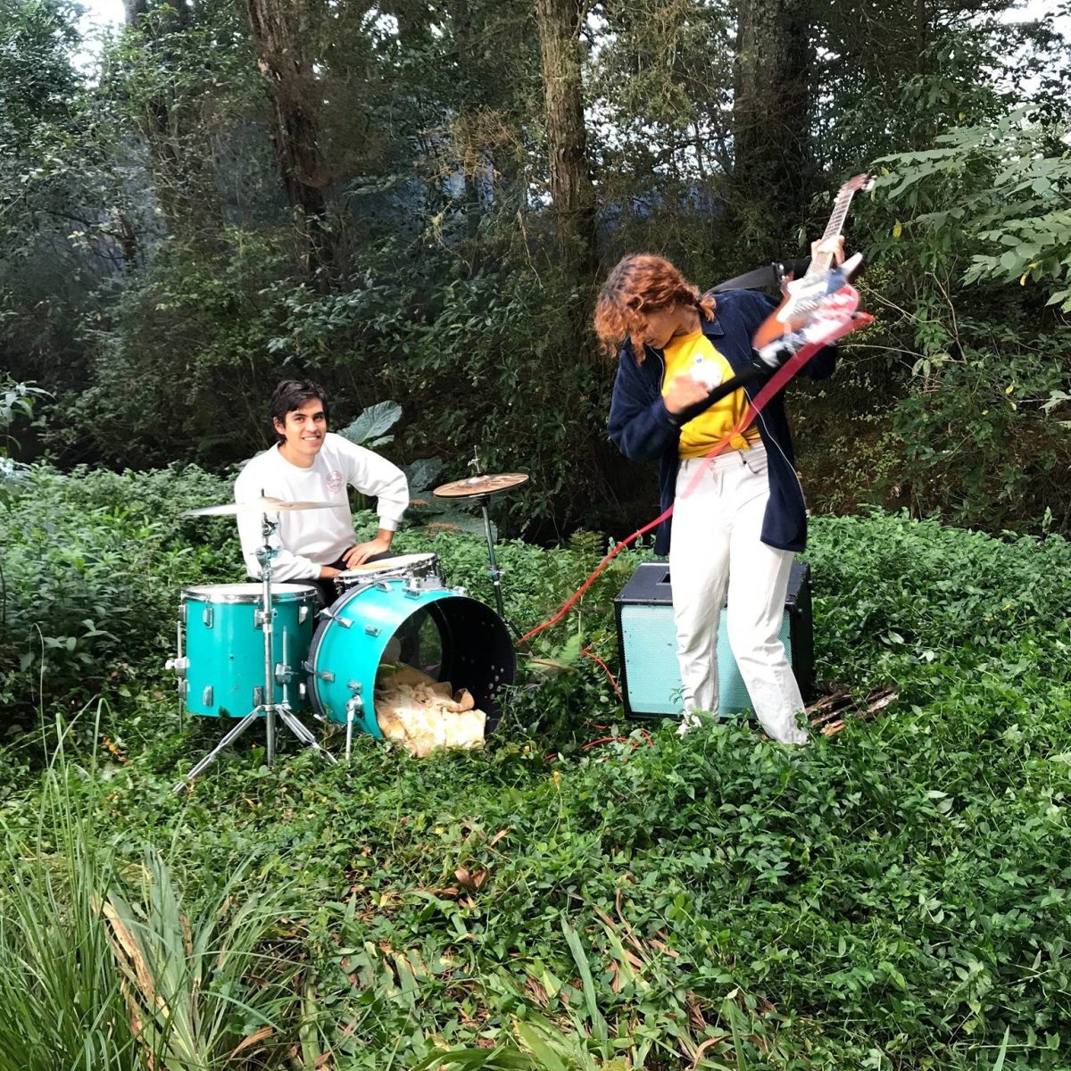 two-member band in a bush setting