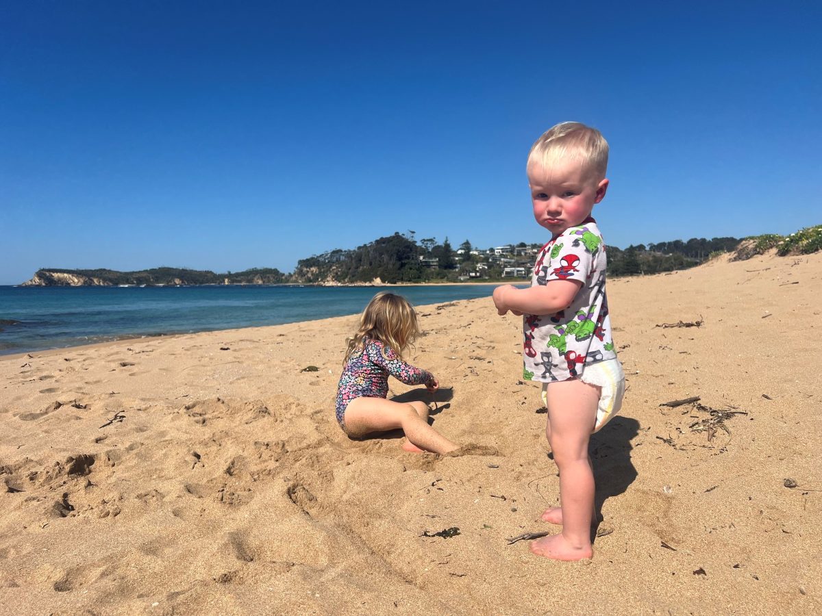 Two children on Malua Bay beach