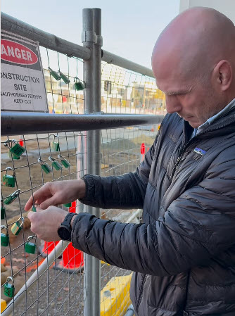 Padlocks on construction fencing