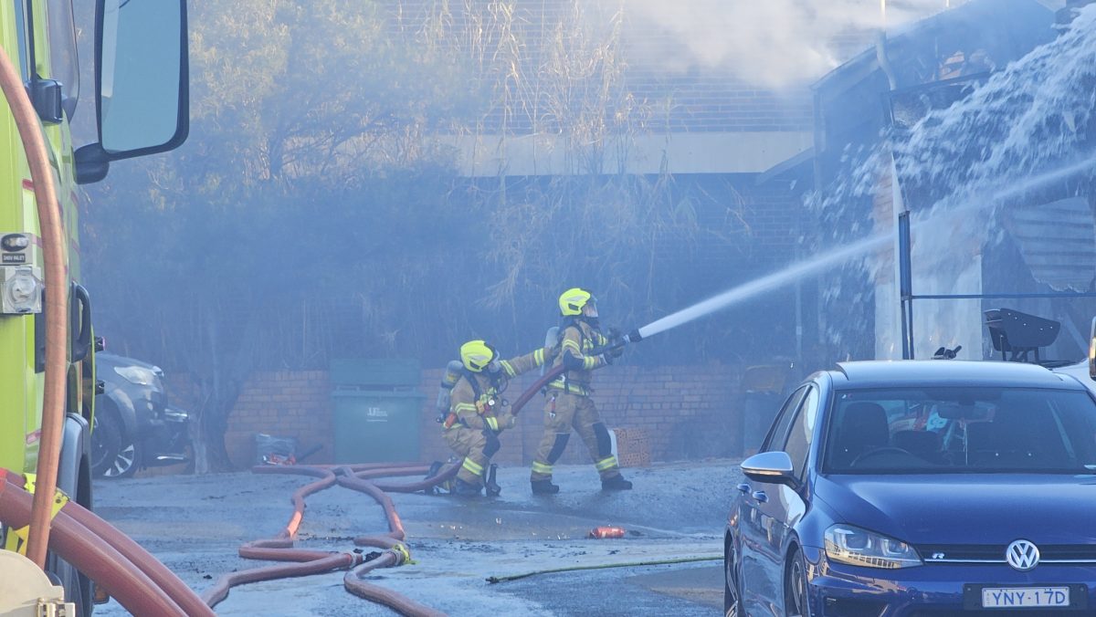 Firefighters work to contain blaze