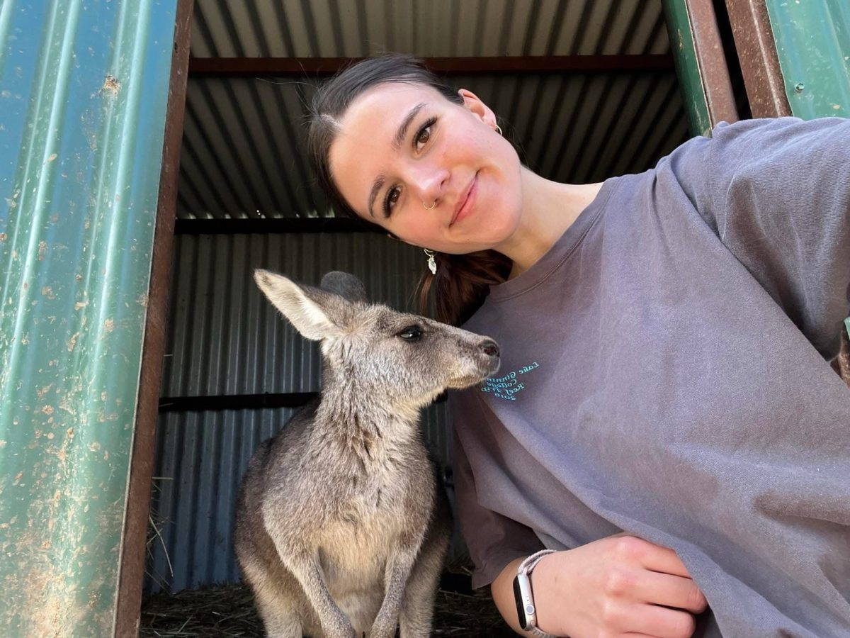 Aisha Bottrill with a kangaroo
