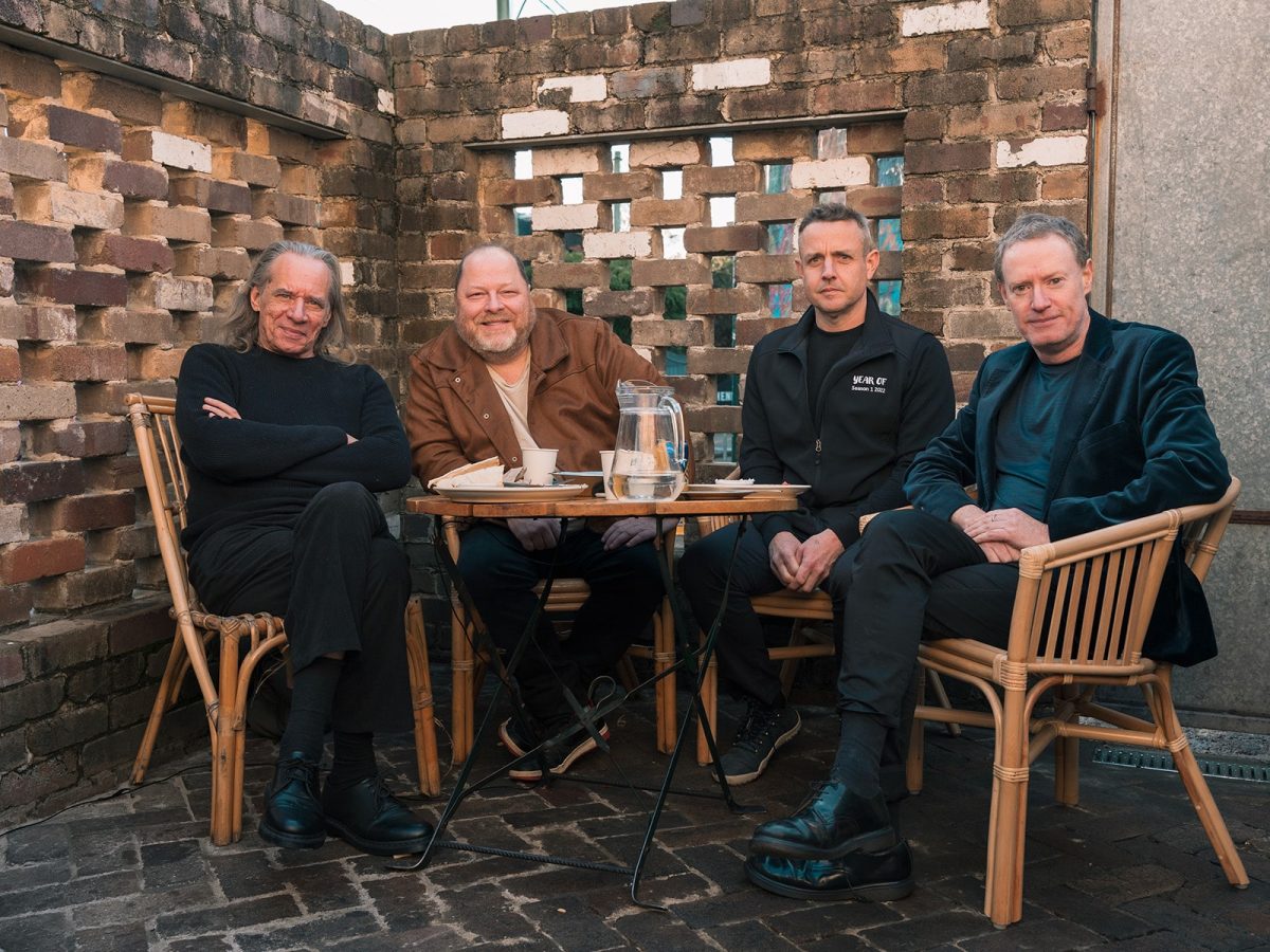 men sitting around a table
