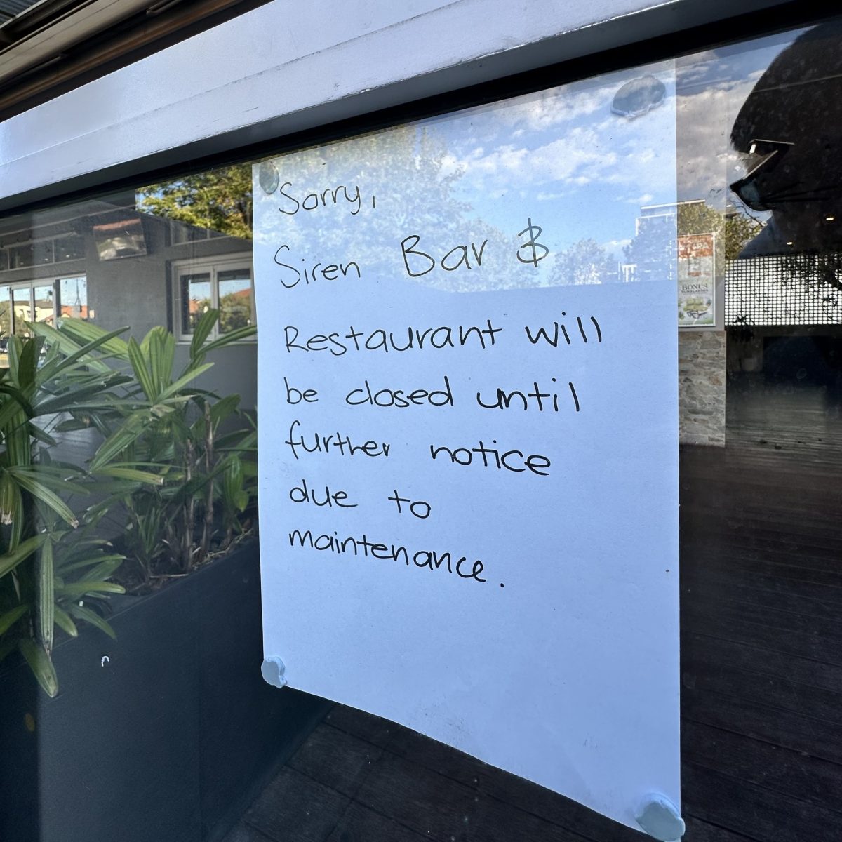 hand-written note on a door