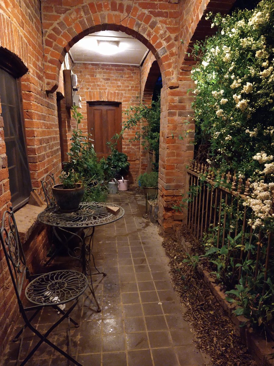 Red brick verandah on heritage building.